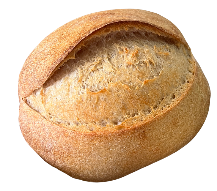 A round loaf of Brödbread sourdough with a curved ear along the top